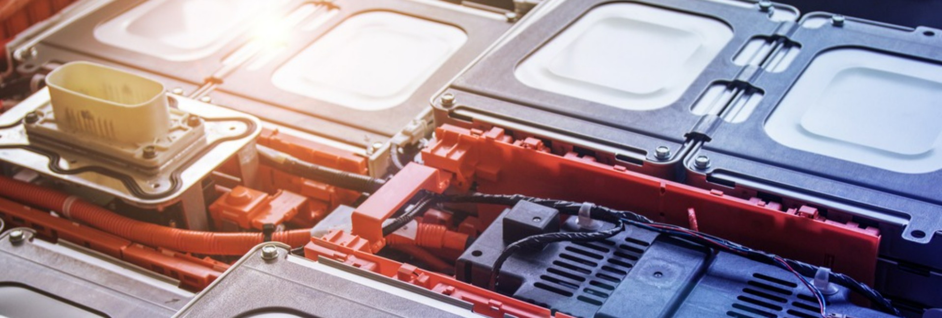 A lithium-ion battery pack designed for electric vehicles, displayed without its cooling system.